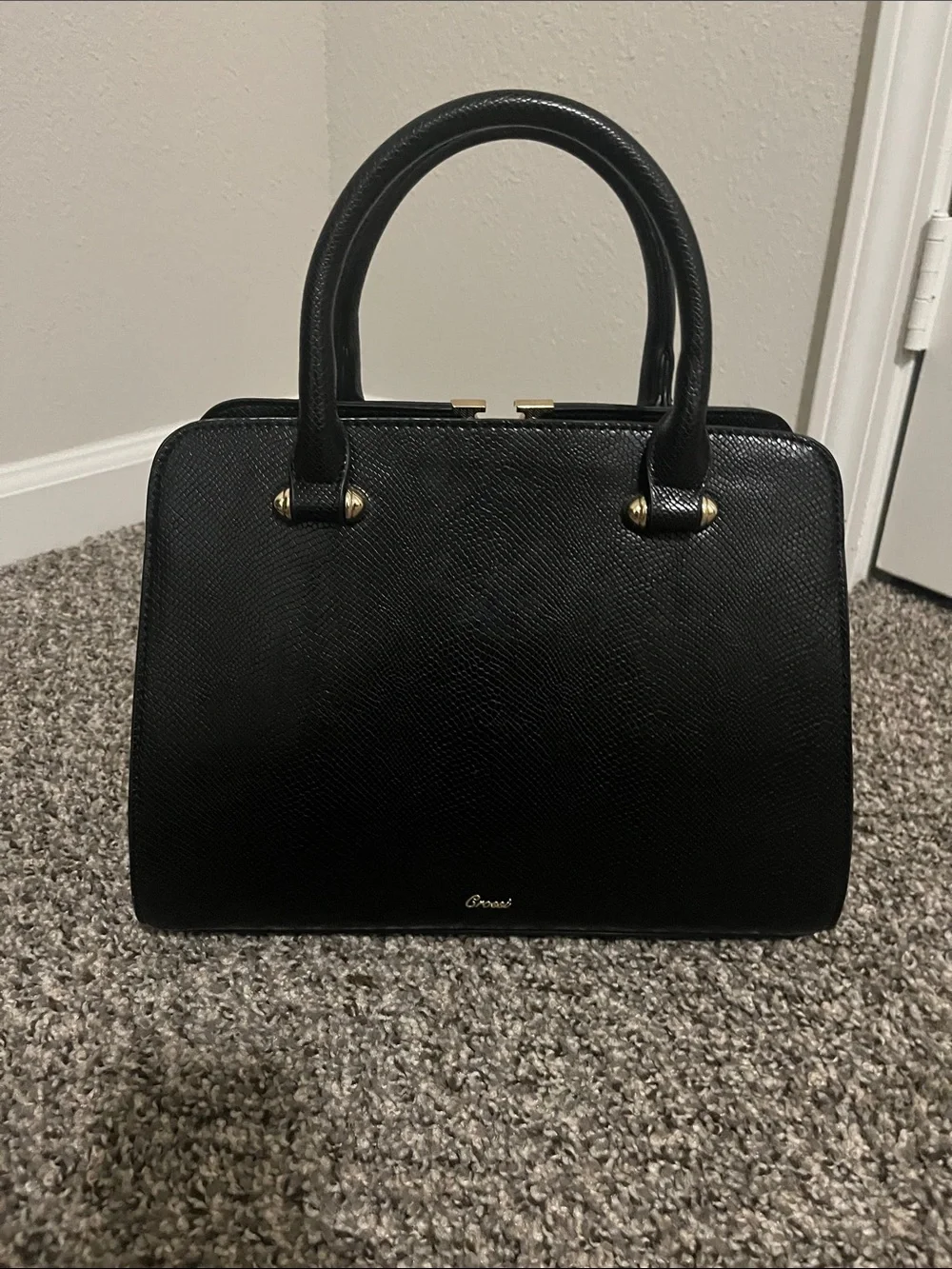 Structured Black Top-Handle Satchel with Tassel Charm